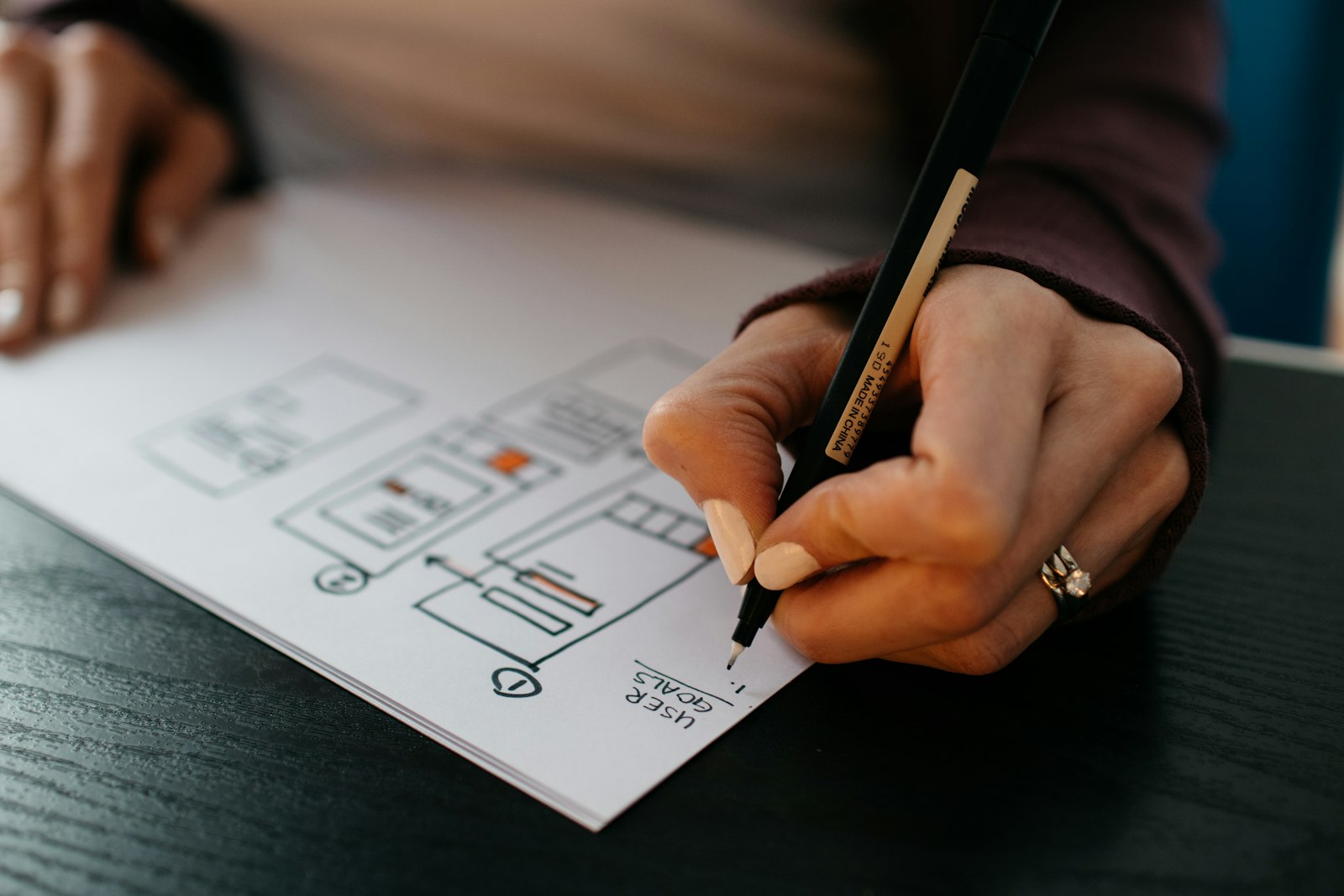 Architectural technician sketching a floor plan