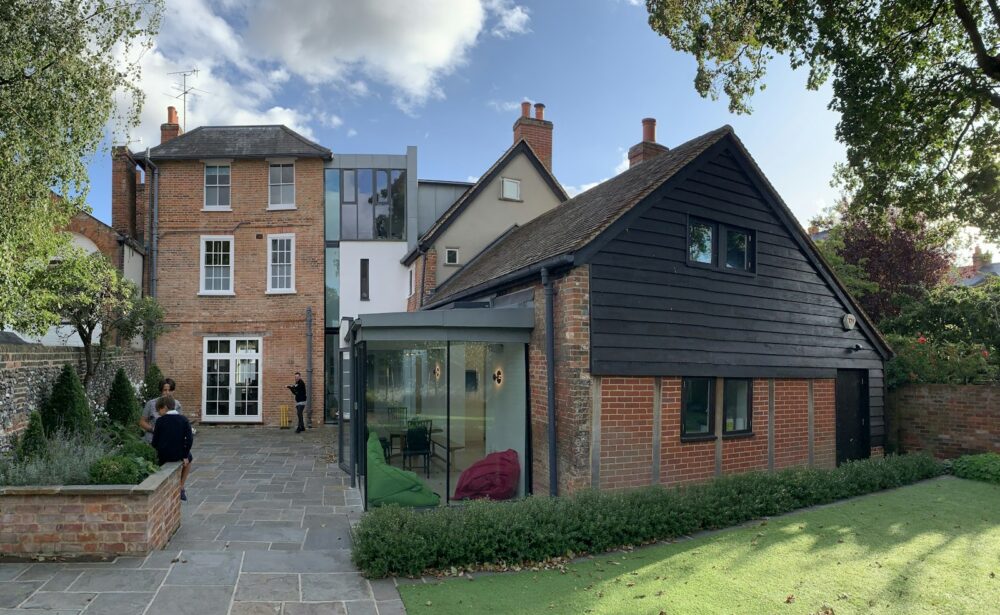 Brick house with a single-storey rear extension
