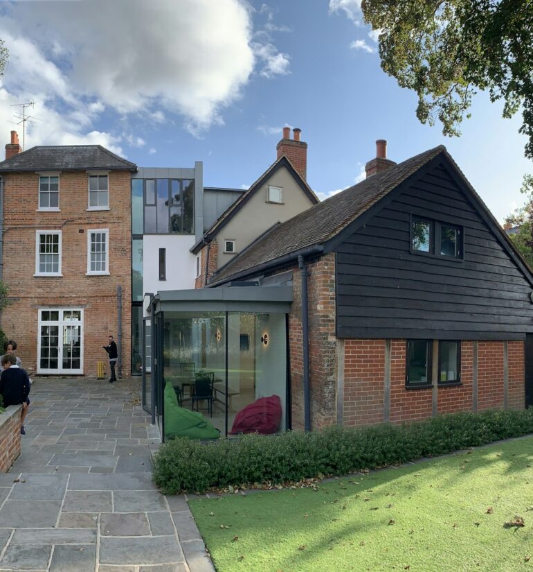 Brick house with a single-storey rear extension