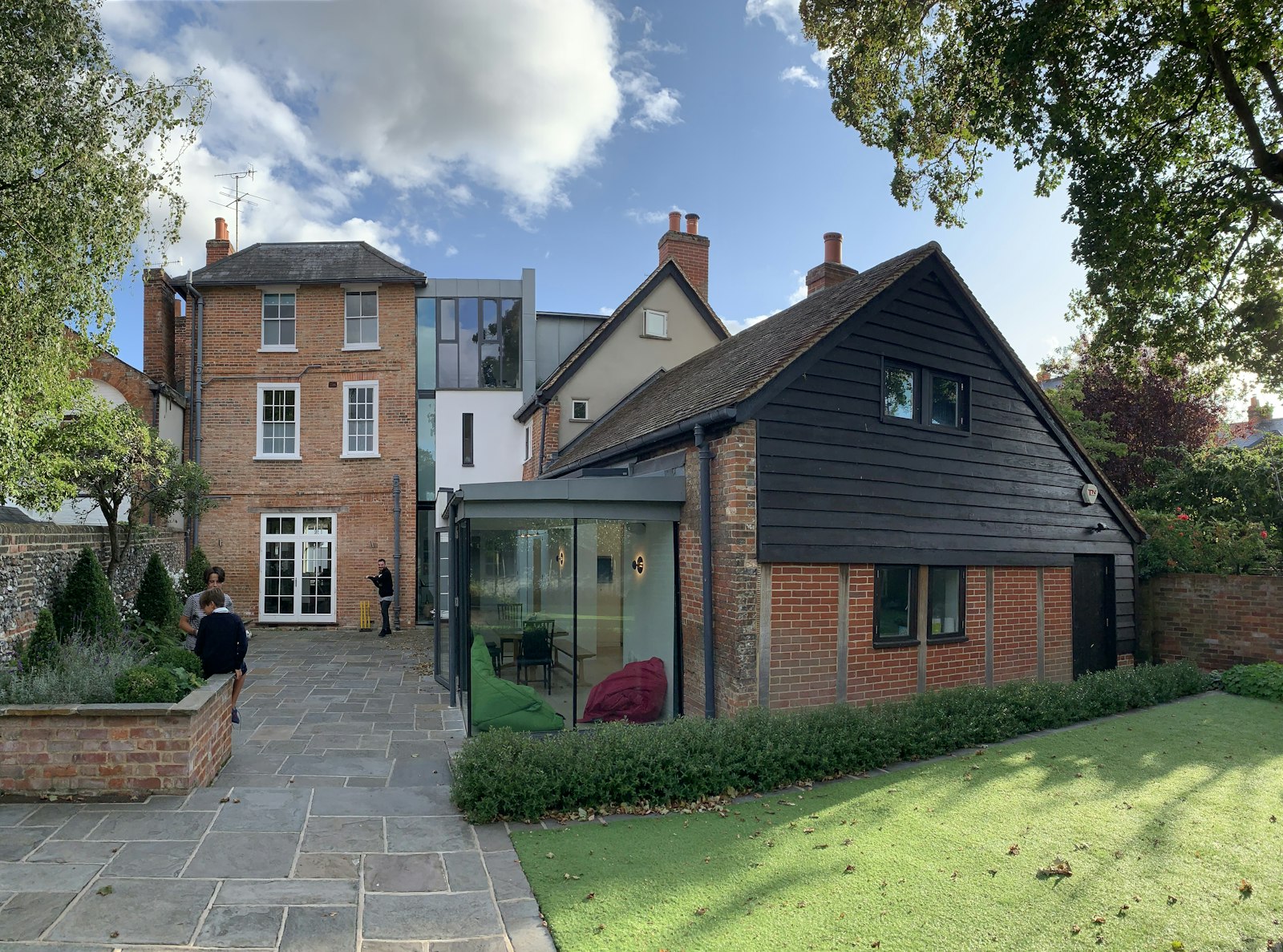 Brick house with a single-storey rear extension