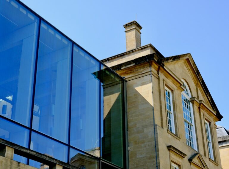 Glazed extension added to a brick house