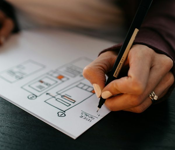 Architectural technician sketching a floor plan